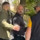 Општинска инспекција покушала да уклони знак „Волим Митровицу“, полиција привела Радојевића и Запорожца