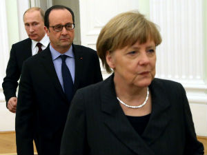 Оланд и Меркелова, притисак на Путина