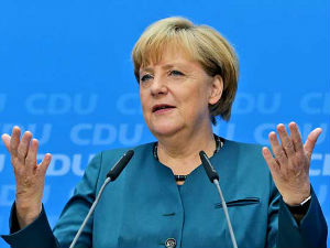 Меркелова позвала избеглице да уче немачки