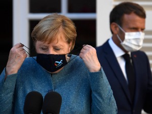 Меркелова и Макрон: Пандемија прилика за нови свет солидарности и сарадње