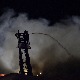 Процењује се штета након пожара у Новом Саду, ватрогасци у приправности испред "Темпа"