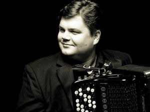 Александер Севастијен, солиста на хармоници